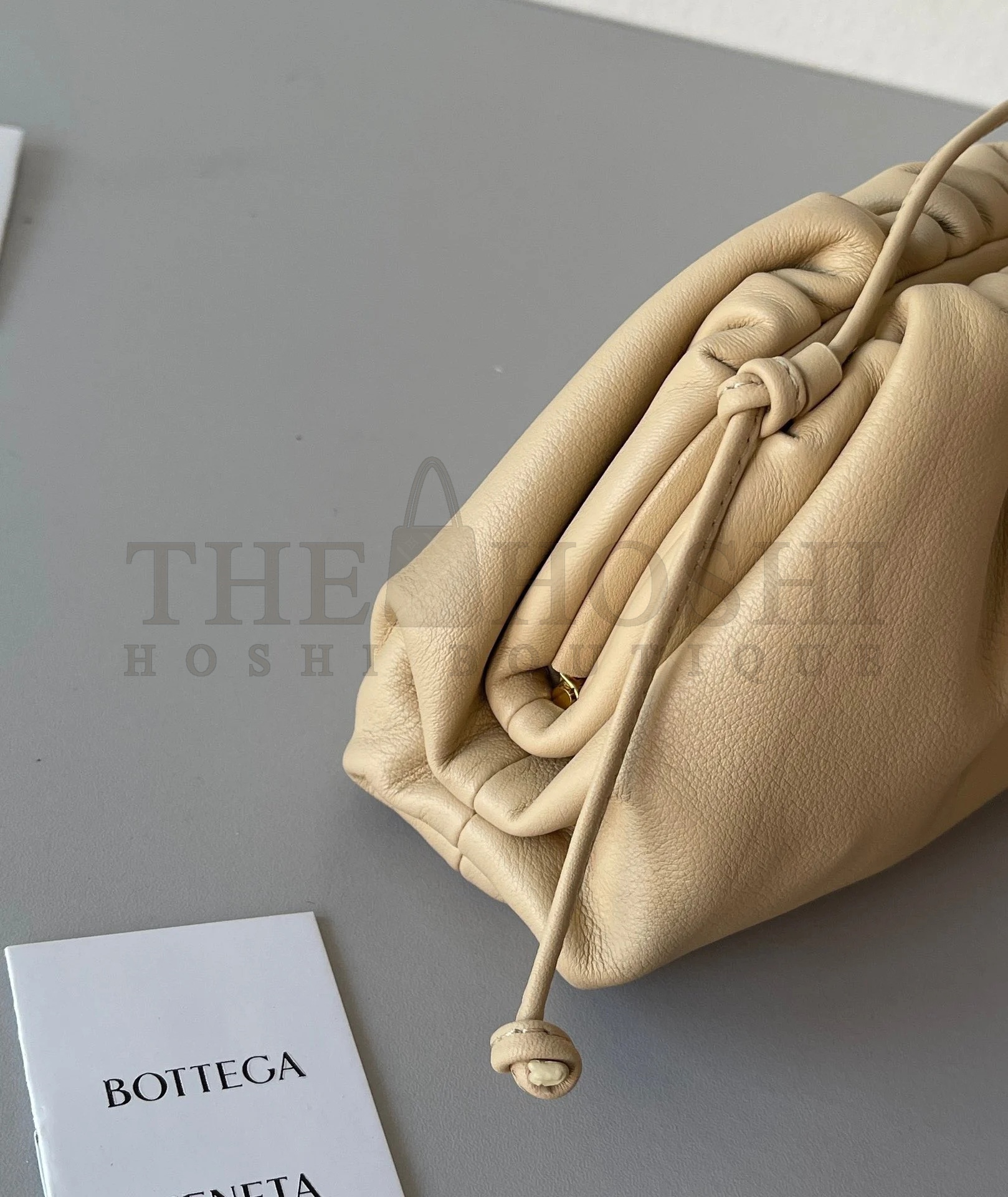 B0tt*ga Ven*ta Mini Pouch with Strap in Almond Calfskin Master Quality