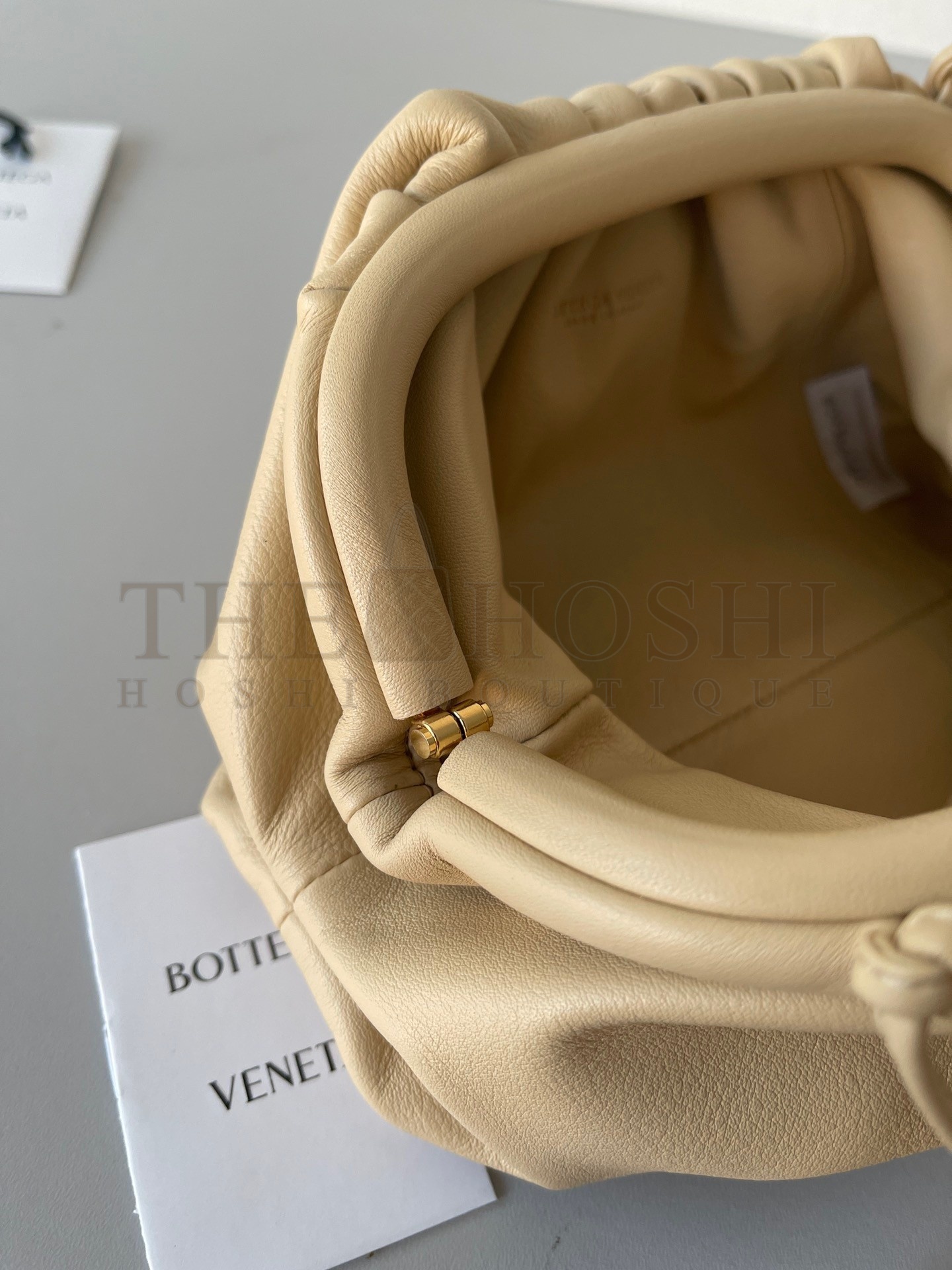 B0tt*ga Ven*ta Mini Pouch with Strap in Almond Calfskin Master Quality